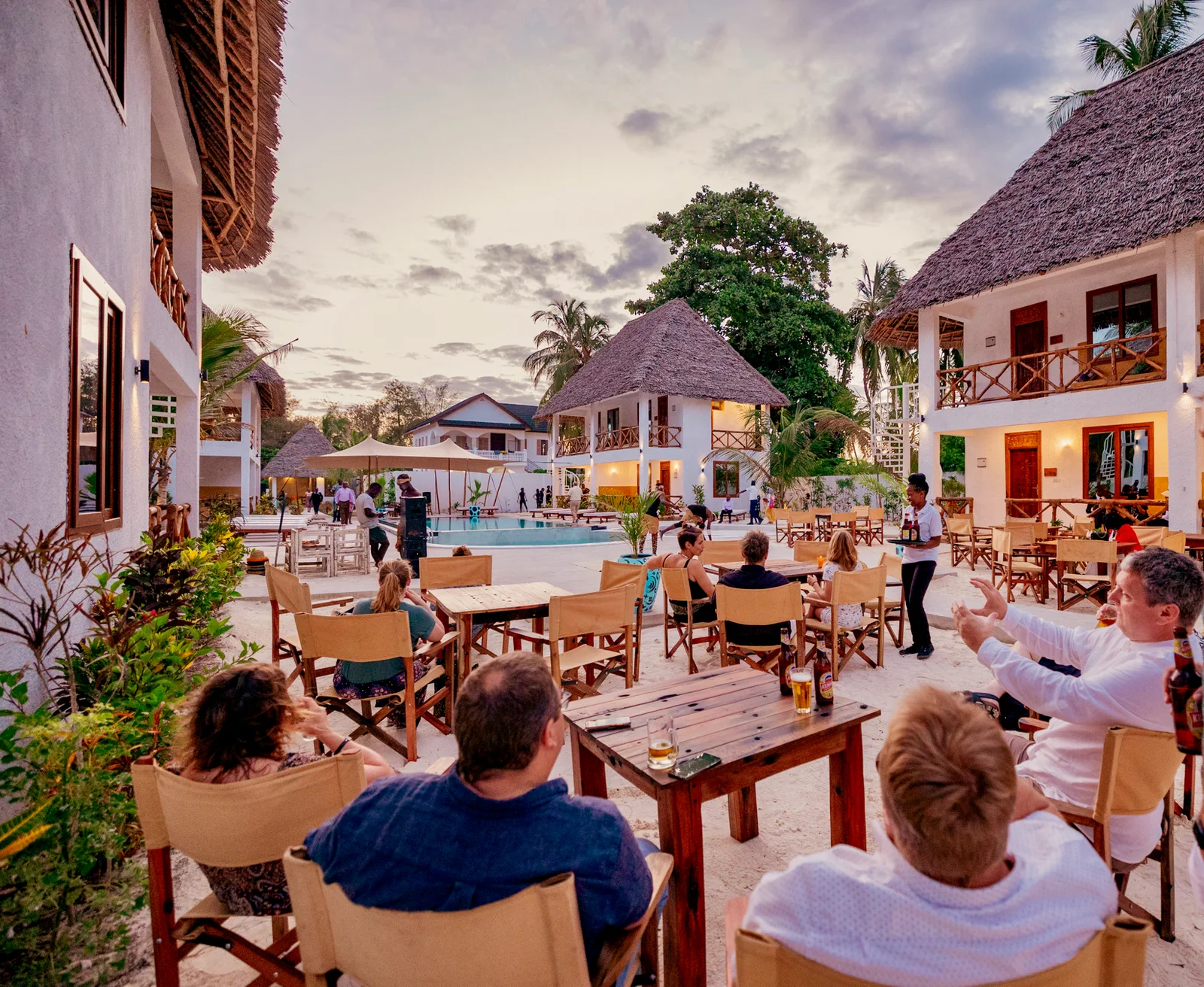 Guests sharing an evening at Mayai Ocean Resort